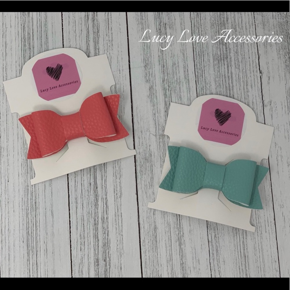 Handmade set of two leather bow hair clips!